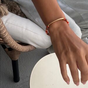 Elegant Gold and Red Beaded Bracelet